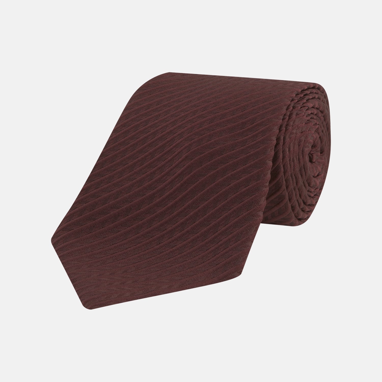 View 1 of product The Turnbull & Asser Burgundy Ottoman Silk Tie features a heavyweight ribbed silk with a subtle diagonal wave pattern, shown rolled up on a plain white background.