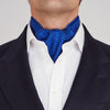 View 2 of product The Turnbull & Asser Royal Blue and White Small Spot Silk Ascot Tie, featuring fine white dots on blue silk, is shown on a plain white background—an elegant finishing touch for any wedding guest outfit.